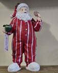 Statuetta decorativa babbo natale con pigiama e latte maxi 18x11x31 cm