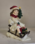 Statuetta natalizia bambina con slitta 10x6x12 cm